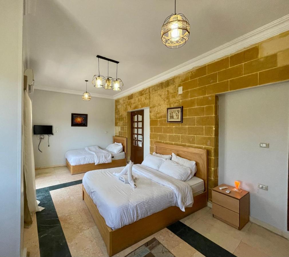 Pyramids Home Inn Il Il Cairo Esterno foto