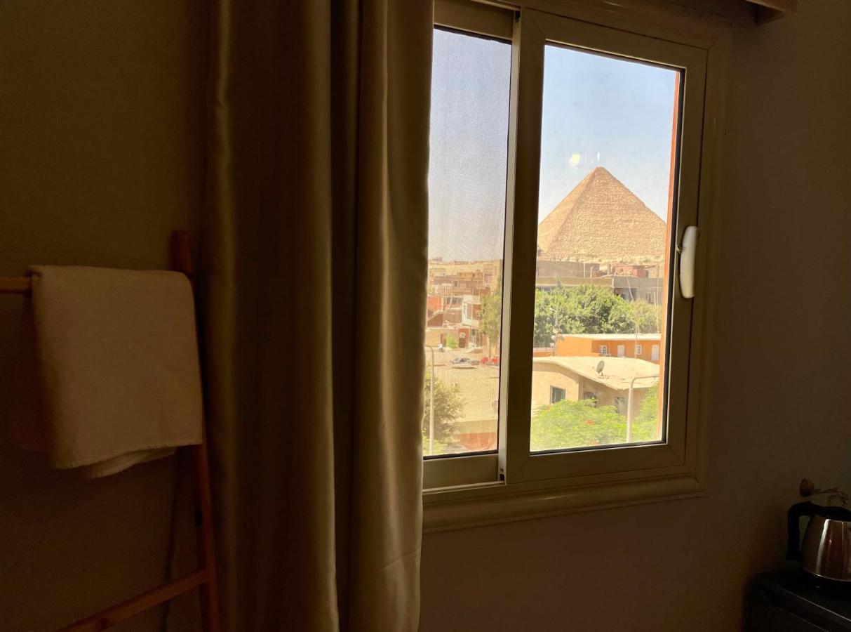 Pyramids Home Inn Il Il Cairo Esterno foto