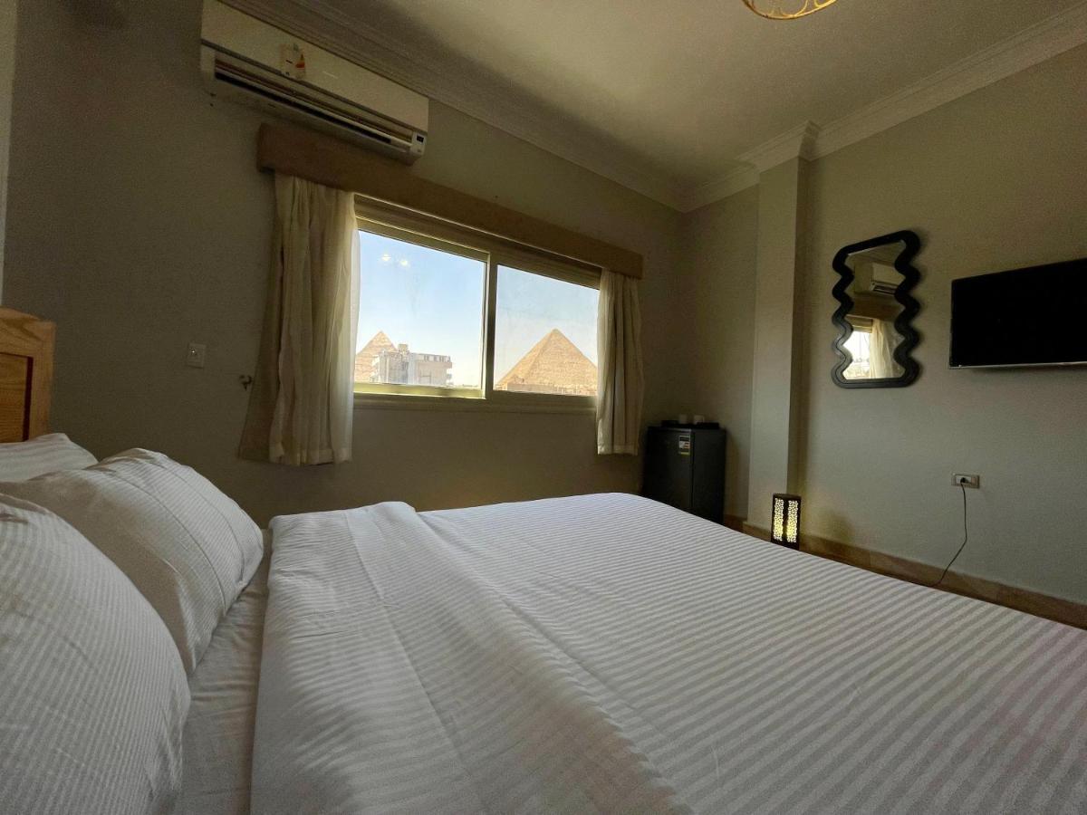 Pyramids Home Inn Il Il Cairo Esterno foto