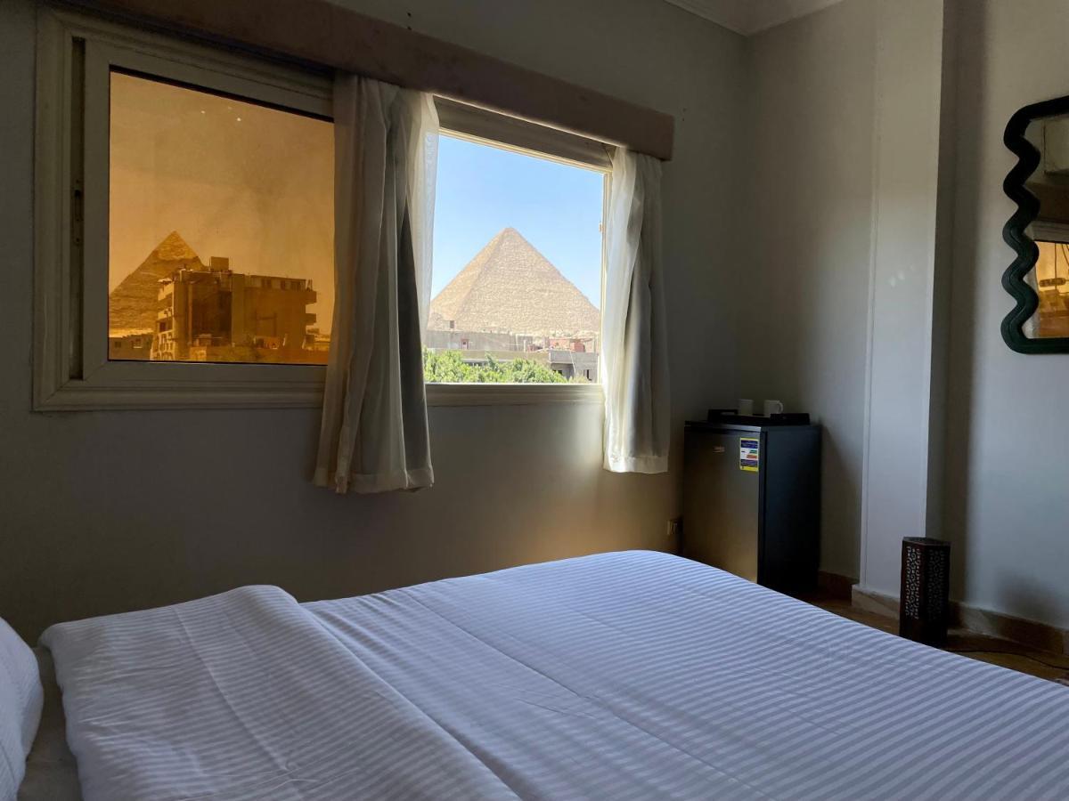 Pyramids Home Inn Il Il Cairo Esterno foto