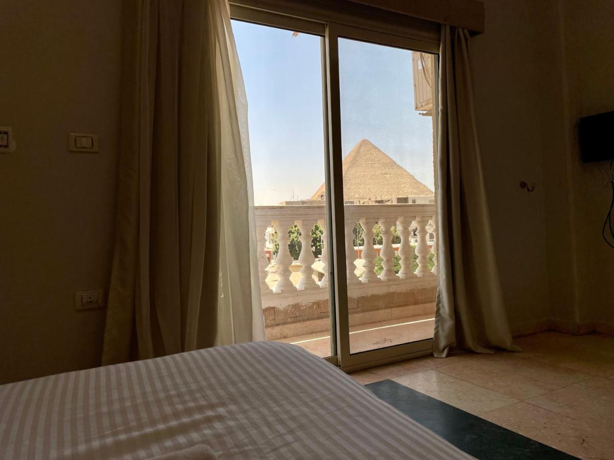 Pyramids Home Inn Il Il Cairo Esterno foto