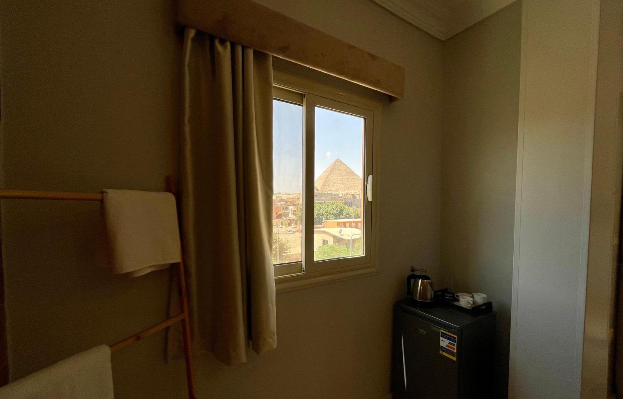 Pyramids Home Inn Il Il Cairo Esterno foto